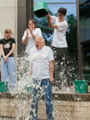 UQ’s Queensland Brain Institute director Professor Perry Bartlett is drenched with a bucket of iced water to raise awareness about motor neuron disease research.